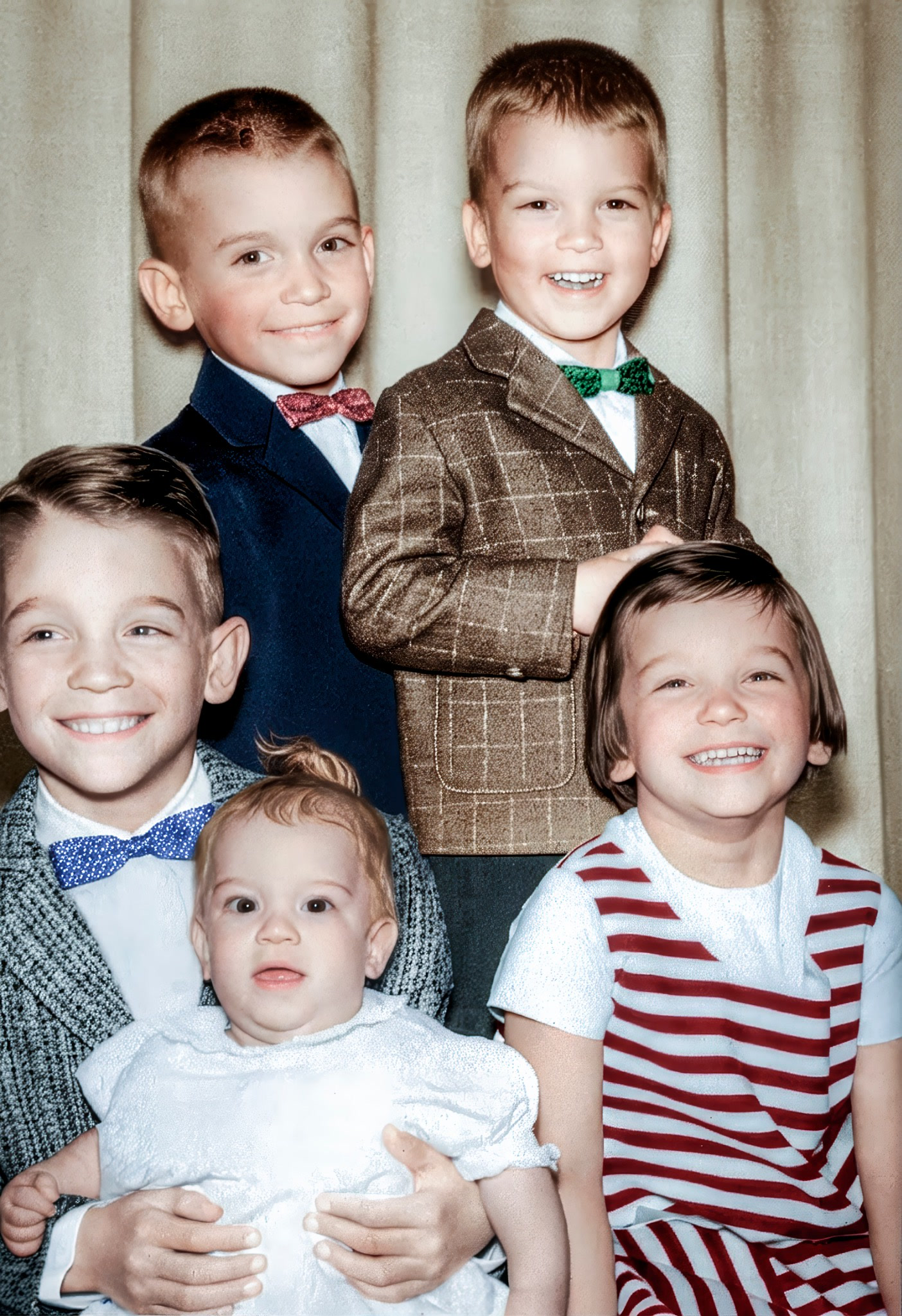 The restored color portrait of the five children with clear faces and period clothing