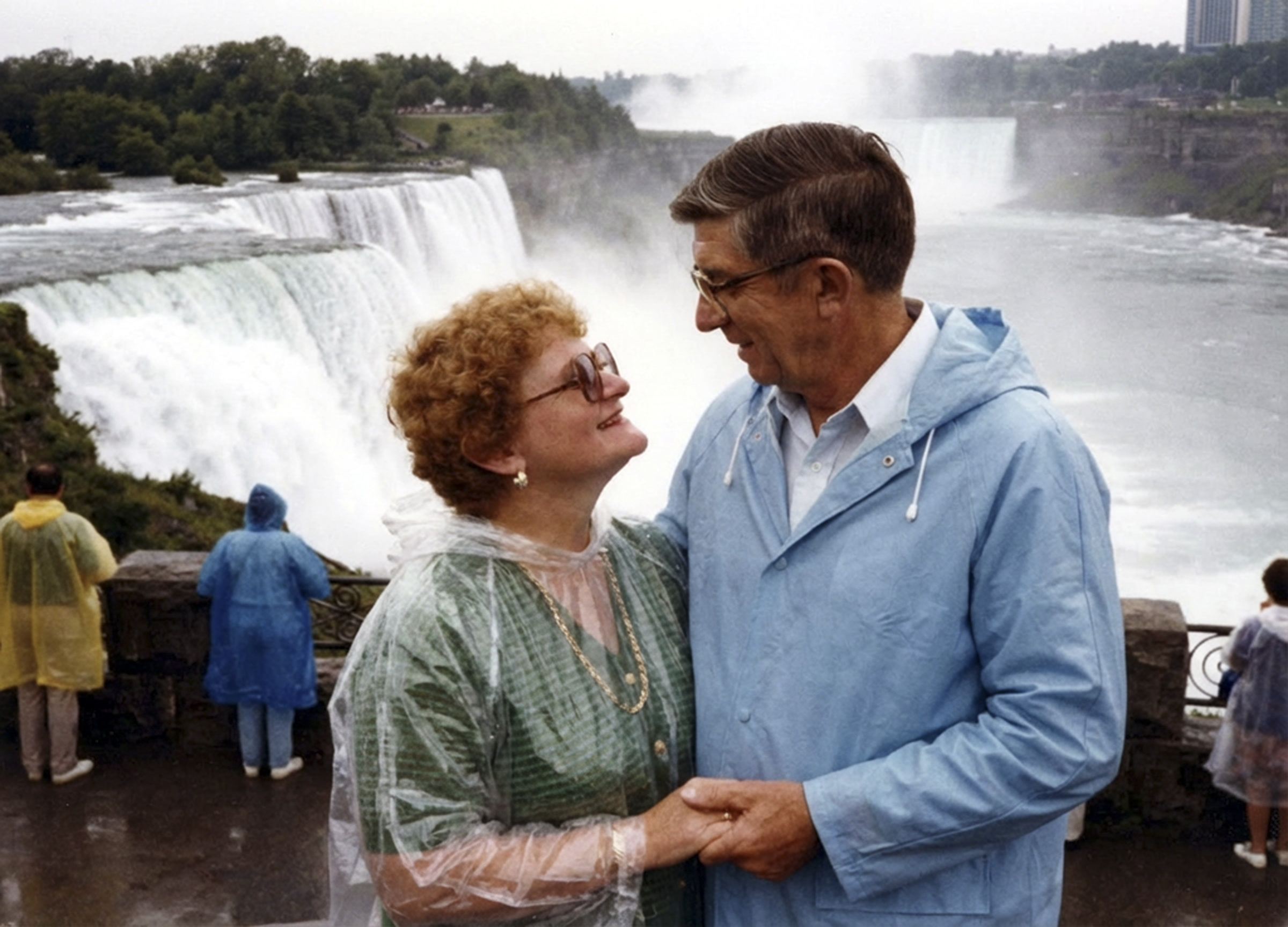 A reconstructed color portrait of the couple holding hands at Niagara Falls